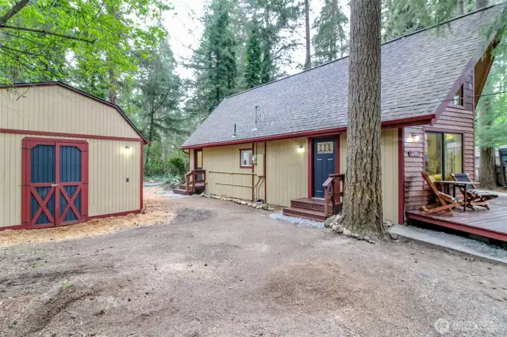 The shed is 8' x 15' and has electricity, water and a toilet drain. There is a toilet and a sink with vanity in there, that are not hooked up, but could be.