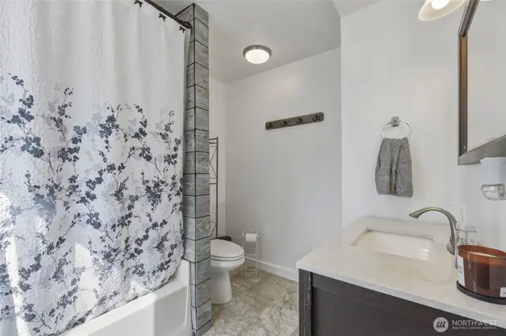 Main floor spacious bathroom.