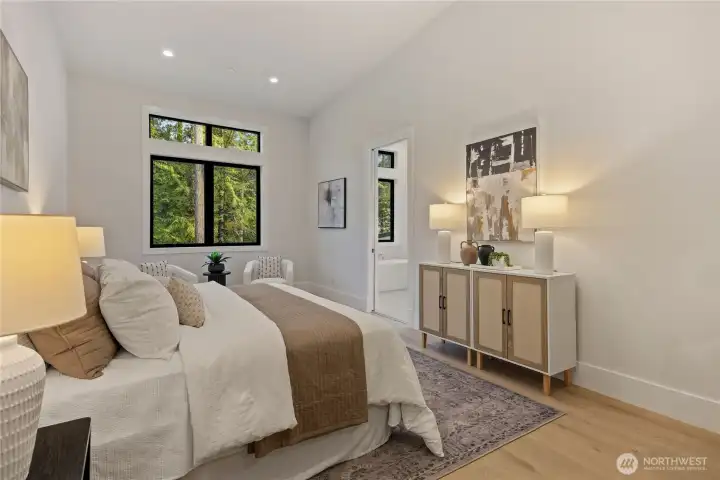 2nd floor Primary bedroom with wooded views