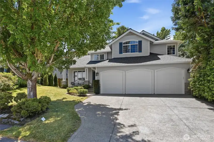 Traditional home with 3 car garage on low traffic street in a well established neighborhood