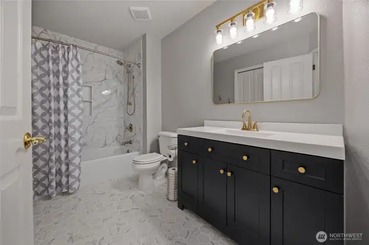 Newly updated hall bathroom located upstairs