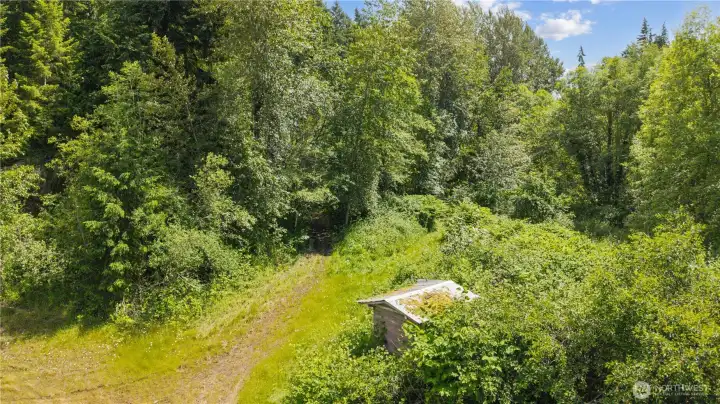 Lower acreage with established vegetation Lower acreage with established vegetation