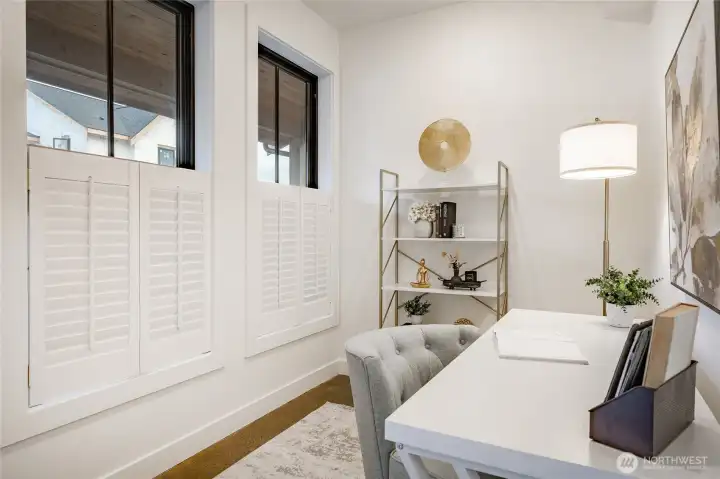 Classic wooden shutters found in the office/den and primary bedroom and ensuite bath. Classic wooden shutters found in the office/den and primary bedroom and ensuite bath.