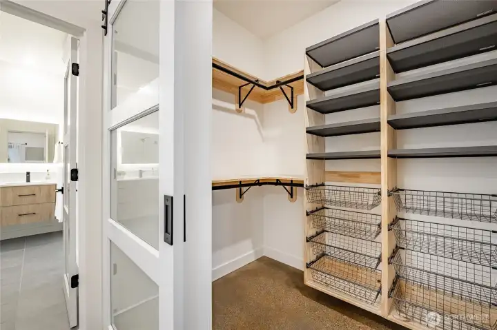 Walk-in closet in primary bedroom Walk-in closet in primary bedroom