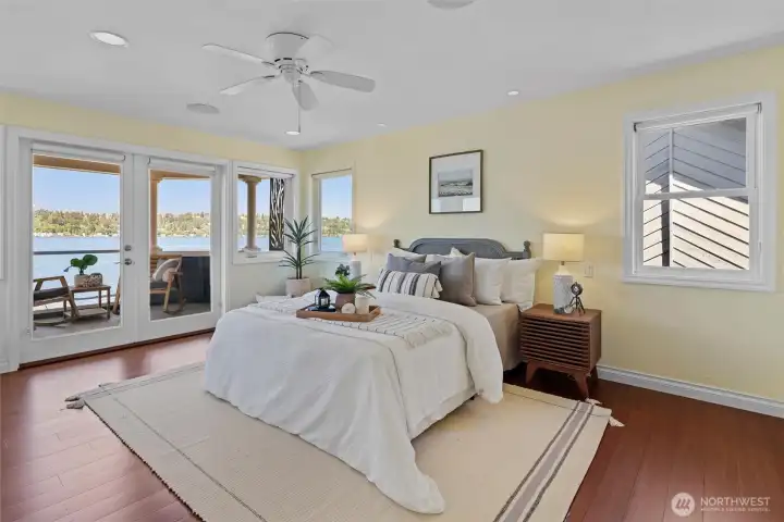 . The luxurious primary suite occupies the upper level and showcases panoramic views, a private covered deck, walk-in closet.