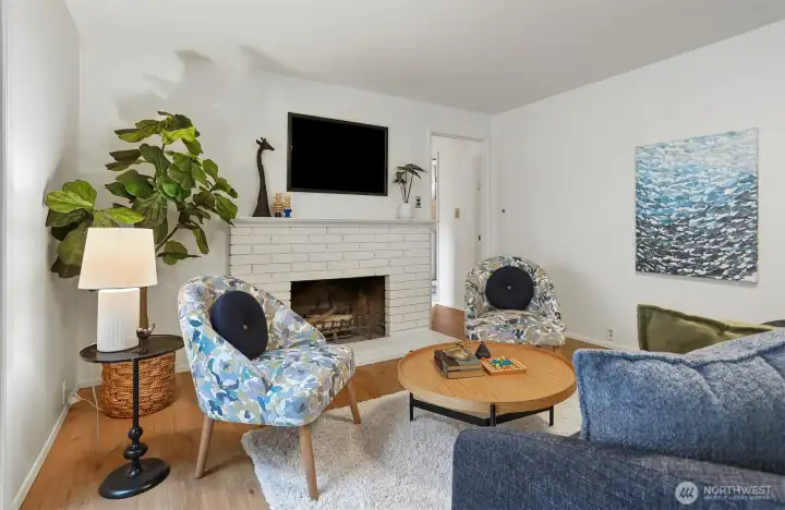 Family room with a cozy fireplace. Family room with a cozy fireplace.