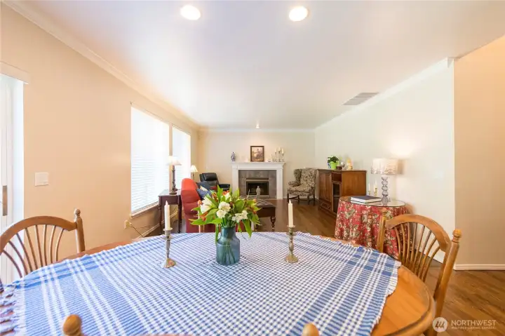 Eating area looking into the family room with fireplace