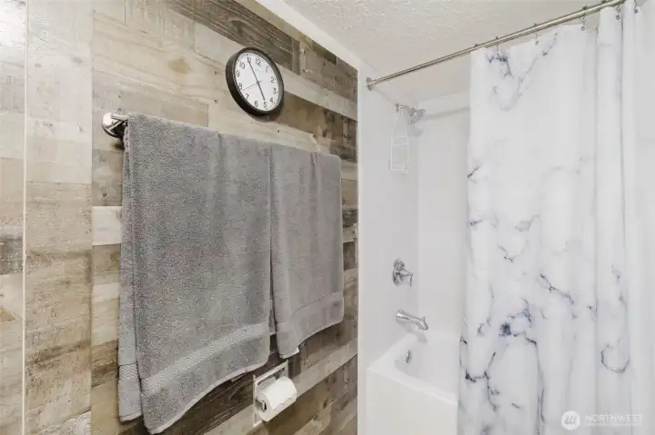 Custom wood work carries throughout the house, including the second bathroom. Custom wood work carries throughout the house, including the second bathroom.