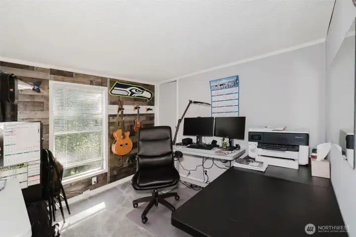 Bedroom #3 is currently being used as a home office. Bedroom #3 is currently being used as a home office.