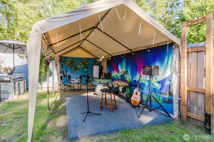Covered stage for karaoke and live music Covered stage for karaoke and live music
