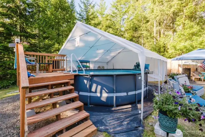 Above ground 16x4 foot heated pool with stairs and a cover over it to enjoy anytime! Above ground 16x4 foot heated pool with stairs and a cover over it to enjoy anytime!