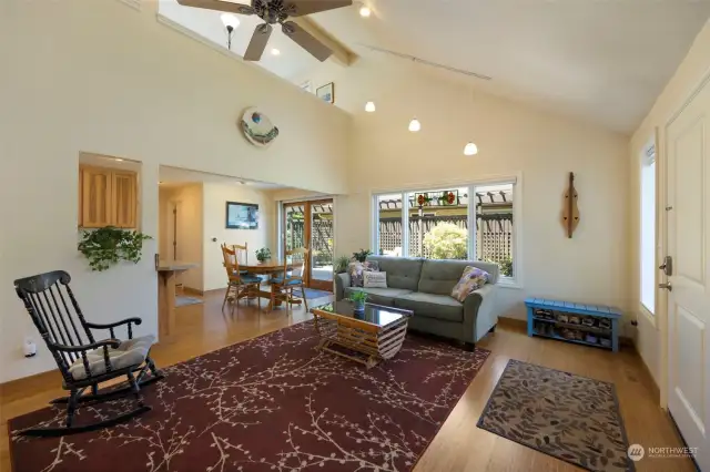 Living room with vaulted ceiling.
