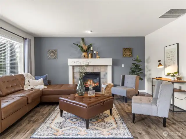 Cozy but spacious living room with gas fireplace.