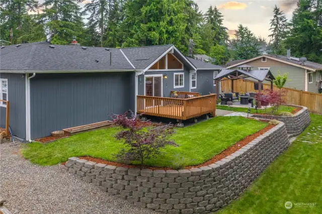Upper and lower backyard are both beautifully landscaped and low maintenance.