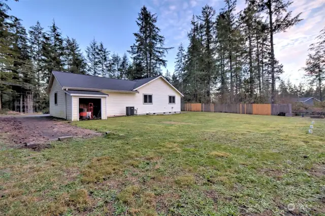 Back of the house with storage shed