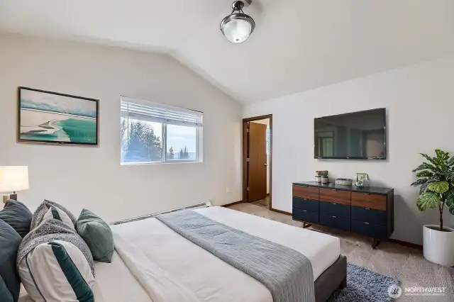 Master bedroom with vaulted ceilings
