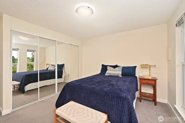 Large mirrored closet in second bedroom