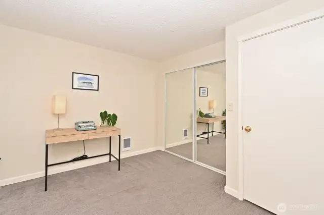 Third bedroom also has a mirrored closet