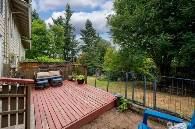 Deck faces the green behind the home