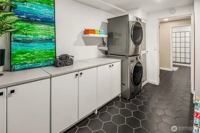 Laundry & mudroom with access to garage