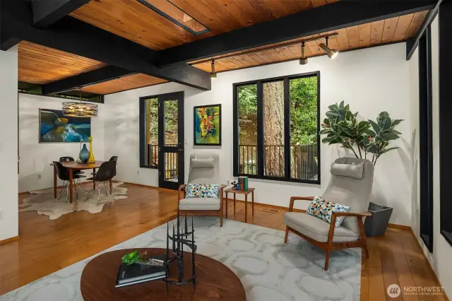 Open living/dining floorplan that flows to the deck
