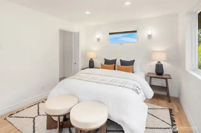 Spacious room with a walk in closet.