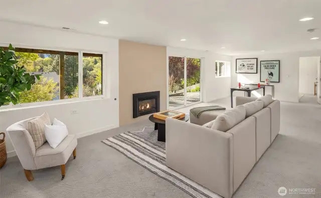Oversized recreation room with plenty of spaces for relaxing and fun.