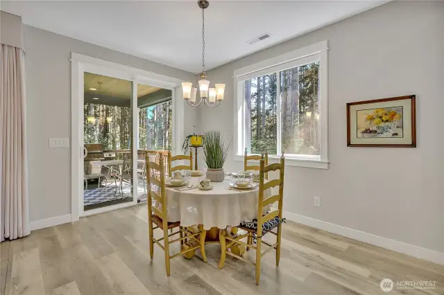 A slider off the dining area allows for seamless indoor-outdoor living.