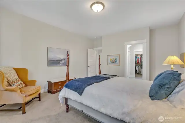 The primary bedroom features a private bath and walk-in closet.