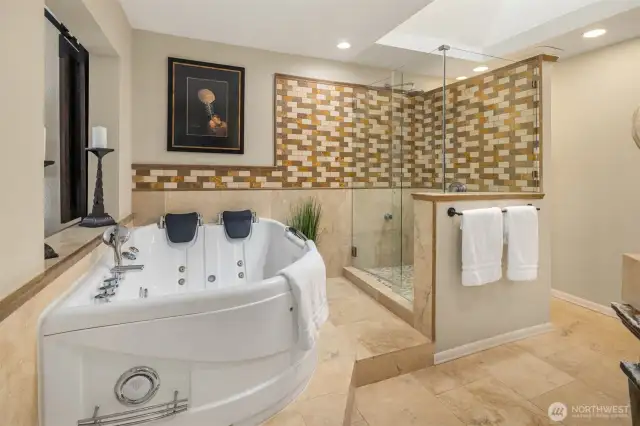 2 person Jetted soaking tub, walk in shower, and duel vanity make this the bathroom lots of fun