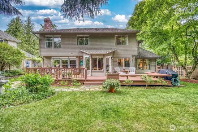 Fully fenced and landscaped 1/4 acre setting.