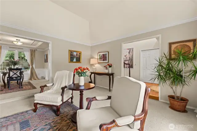 Wall-to-wall carpet in the living and dining areas.