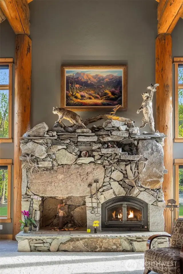 Gorgeous 2-story living space with stunning custom fireplace