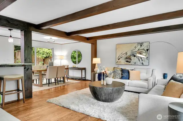 Exposed beams warm up this bright, open great room.