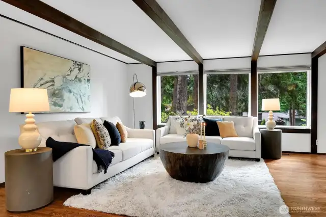 Plenty of light brings the views of trees into this freshly painted home.