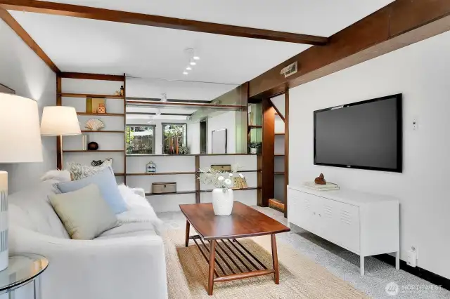 On the lower level, this rec room offers plenty of storage, full-height ceilings and light.