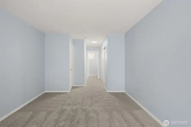 Primary bedroom looking to primary bathroom.