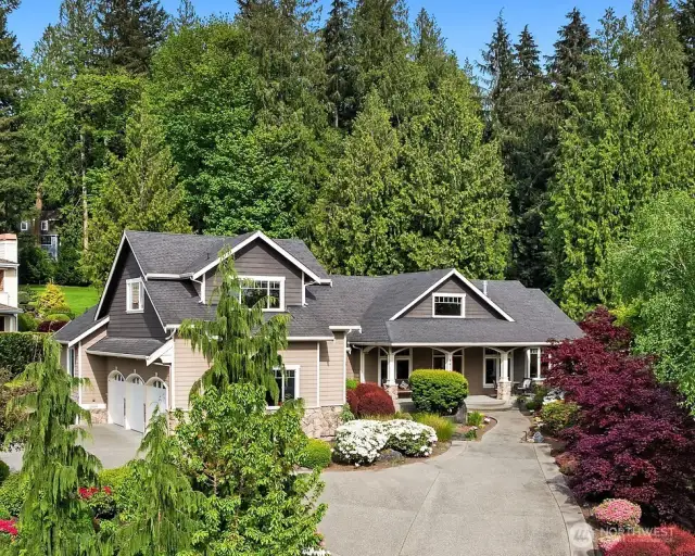 This custom home, on a shy acre, was meticulously designed and maintained. Positioned on top of the hill and facing west, the home enjoys maximum light exposure throughout the year