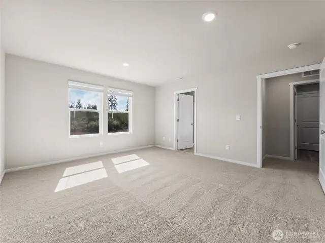 Primary bedroom leads to ensuite.  Finishes and options will vary.