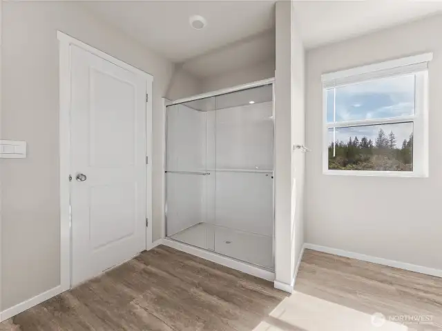 Primary bathroom shower.  Finishes and options will vary.