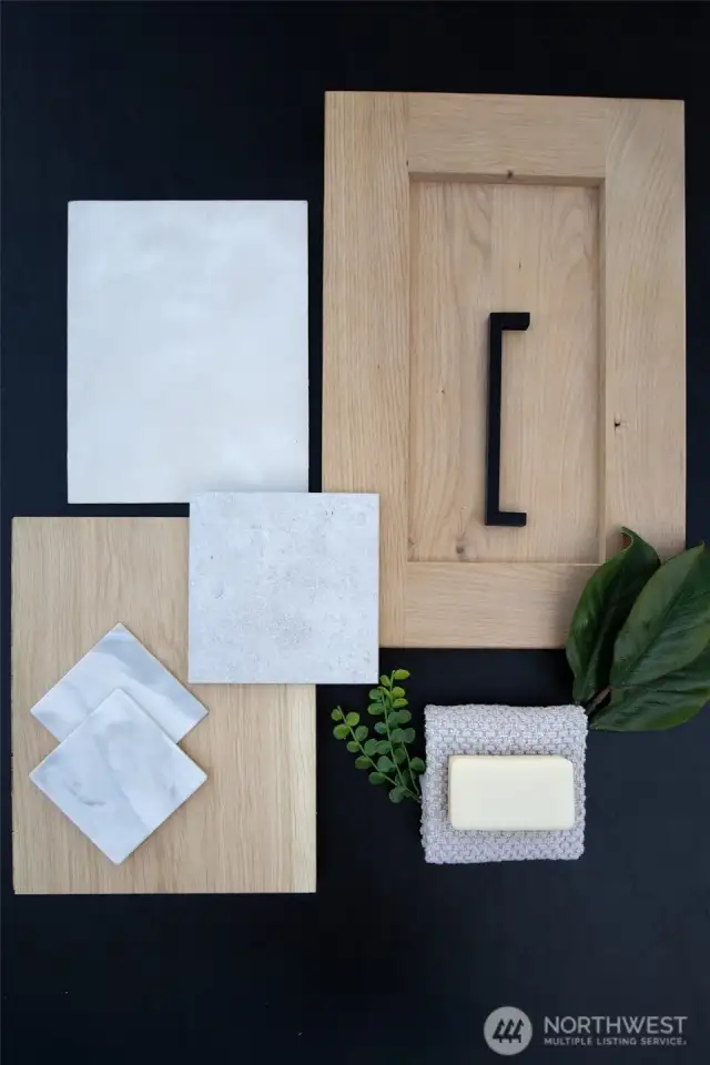 Primary Bathroom: White oak custom vanity with dual sinks, Heated floors, Regal Arabescato quartz bench, double glass frnech doors, dual custom closets