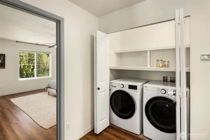 Updated laundry area with plenty of storage. Keep things organized and out of sight!