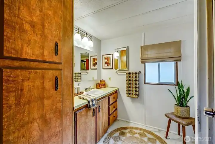 Primary 3/4 bathroom attached. Digitally staged.