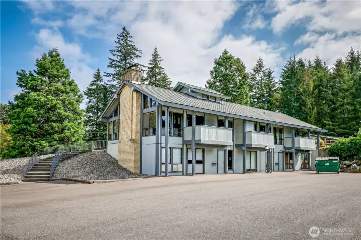 Community clubhouse with ample parking for guests.