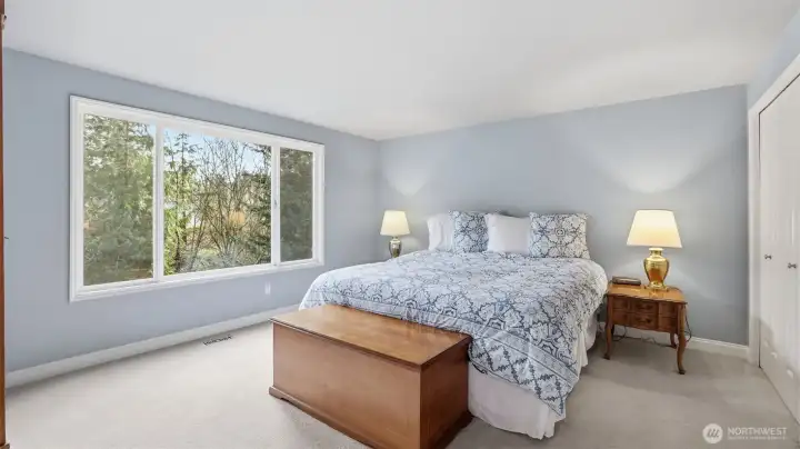 The primary suite has double doors as you enter a walk-in closet plus a secondary closet.  Very well sized for your furniture.