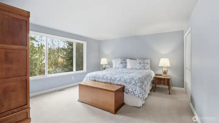 The primary suite also has a view into your own backyard that you will never get tired of looking at.