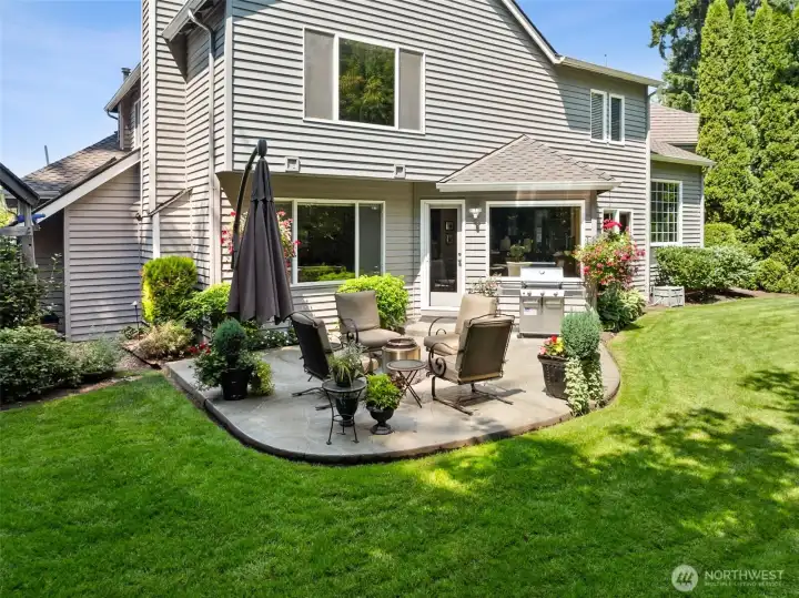 The backyard is partially fenced with a full sprinkler system and plenty of room to play and have fun.