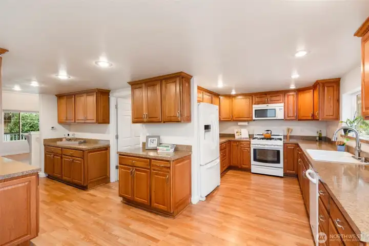 Kitchen has an impressive amount of storage and workspace with a nice view!