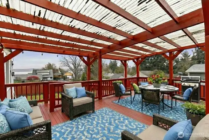 Spacious back deck with views of Dyes Inlet.