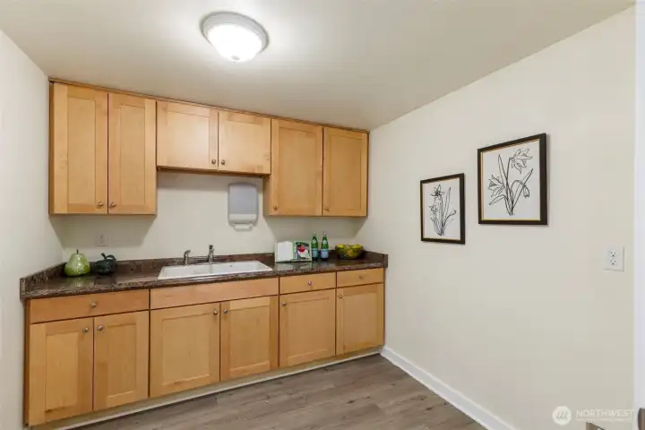 Partial kitchen: plumbed for fridge.